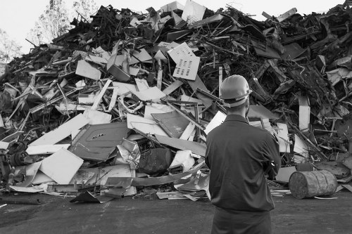 Construction site with builders waste containers in Dartmouth Park