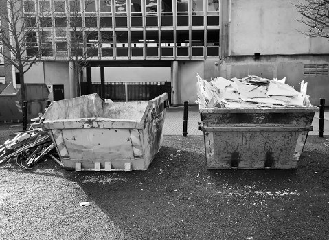 Construction site managing builders waste in Queens Park