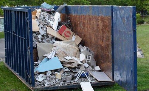 Rubbish removal truck in North West London
