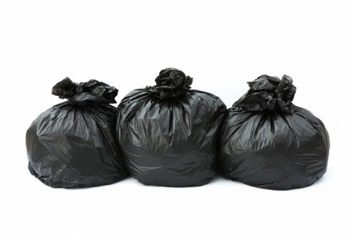 Recycling bins and waste segregation in a community area